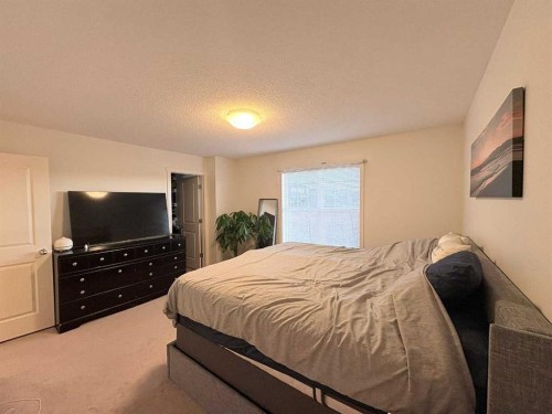 36 Evansborough Common Nw, Calgary, AB - Indoor Photo Showing Bedroom