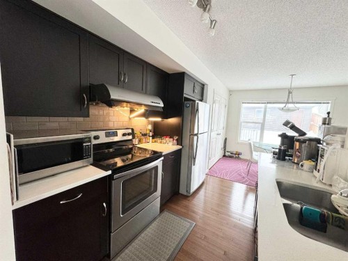 36 Evansborough Common Nw, Calgary, AB - Indoor Photo Showing Kitchen With Stainless Steel Kitchen