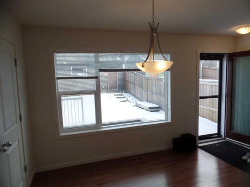 36 Evansborough Common Nw, Calgary, AB - Indoor Photo Showing Other Room