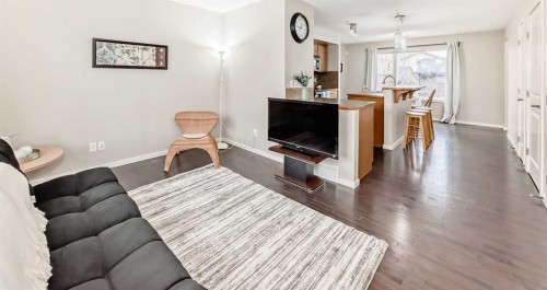 822 Panatella Boulevard Nw, Calgary, AB - Indoor Photo Showing Living Room