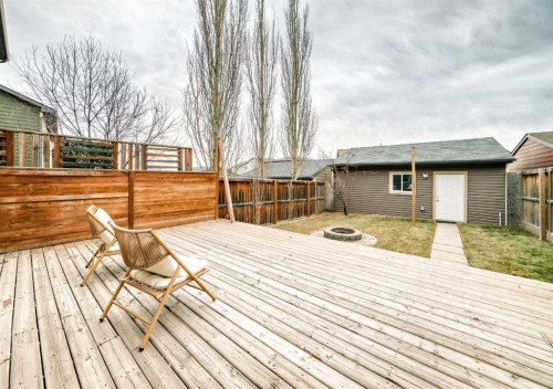 822 Panatella Boulevard Nw, Calgary, AB - Outdoor With Deck Patio Veranda With Exterior