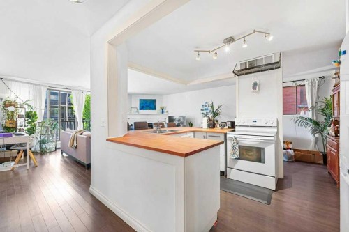 B-518 18 Avenue Sw, Calgary, AB - Indoor Photo Showing Kitchen With Double Sink