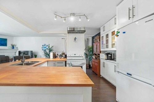 B-518 18 Avenue Sw, Calgary, AB - Indoor Photo Showing Kitchen With Double Sink