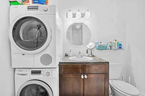B-518 18 Avenue Sw, Calgary, AB - Indoor Photo Showing Laundry Room