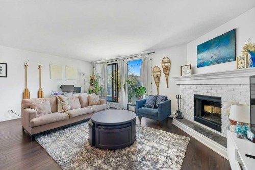 B-518 18 Avenue Sw, Calgary, AB - Indoor Photo Showing Living Room With Fireplace