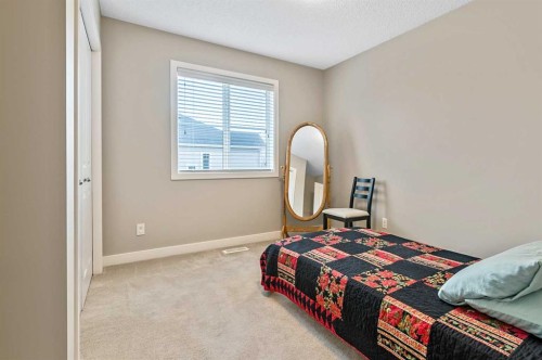 56-351 Monteith Drive Se, High River, AB - Indoor Photo Showing Bedroom