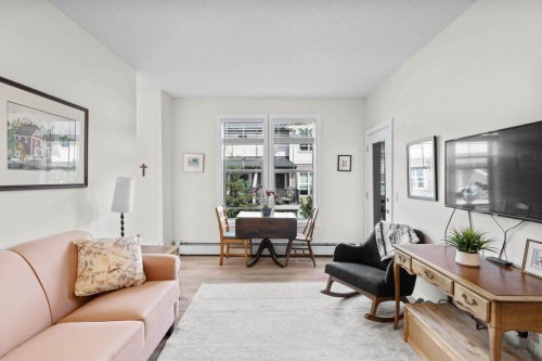 304-201 Sunset Drive, Cochrane, AB - Indoor Photo Showing Living Room