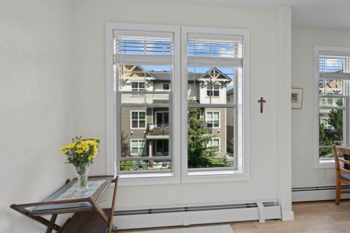 304-201 Sunset Drive, Cochrane, AB - Indoor Photo Showing Other Room