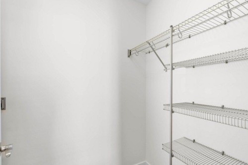 304-201 Sunset Drive, Cochrane, AB - Indoor With Storage