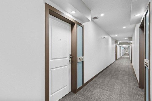 304-201 Sunset Drive, Cochrane, AB - Indoor Photo Showing Other Room