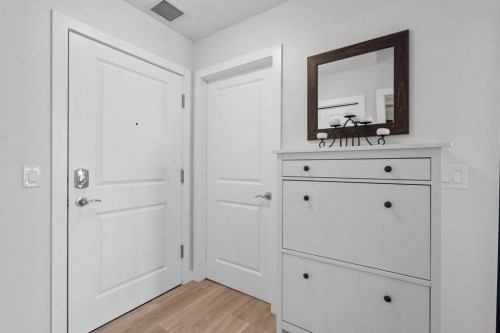 304-201 Sunset Drive, Cochrane, AB - Indoor Photo Showing Other Room