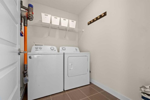 1112 Williamstown Boulevard Nw, Airdrie, AB - Indoor Photo Showing Laundry Room