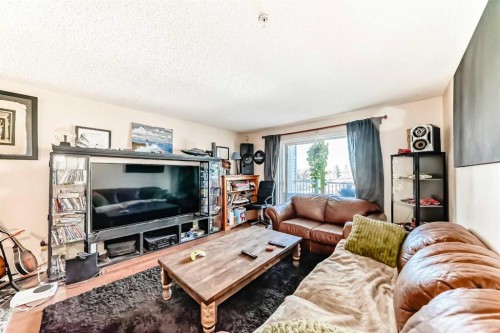 1317-6224 17 Avenue Se, Calgary, AB - Indoor Photo Showing Living Room