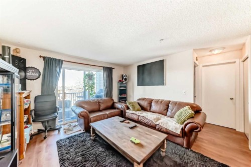 1317-6224 17 Avenue Se, Calgary, AB - Indoor Photo Showing Living Room