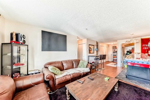 1317-6224 17 Avenue Se, Calgary, AB - Indoor Photo Showing Living Room