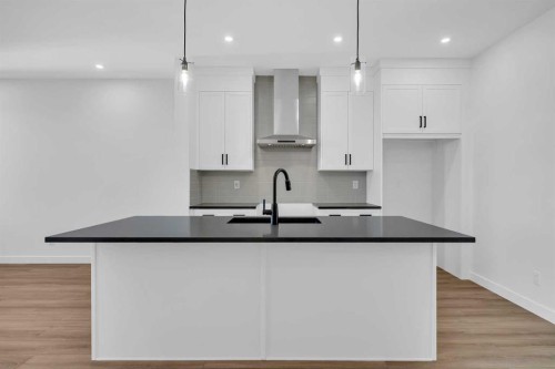 14 Versant Path Sw, Calgary, AB - Indoor Photo Showing Kitchen With Upgraded Kitchen