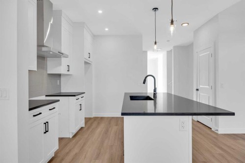 14 Versant Path Sw, Calgary, AB - Indoor Photo Showing Kitchen With Upgraded Kitchen