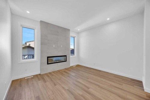 14 Versant Path Sw, Calgary, AB - Indoor With Fireplace