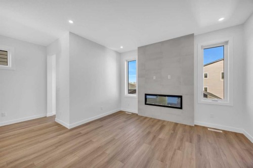 14 Versant Path Sw, Calgary, AB - Indoor With Fireplace
