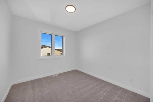 14 Versant Path Sw, Calgary, AB - Indoor Photo Showing Other Room