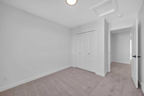 14 Versant Path Sw, Calgary, AB - Indoor Photo Showing Other Room
