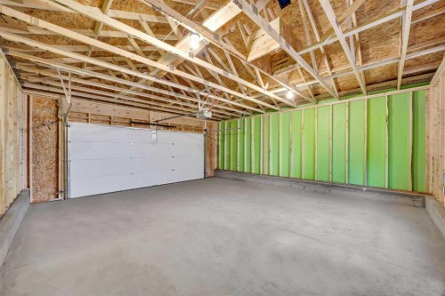 14 Versant Path Sw, Calgary, AB - Indoor Photo Showing Garage