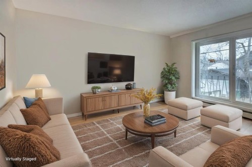 4-916 3 Avenue Nw, Calgary, AB - Indoor Photo Showing Living Room