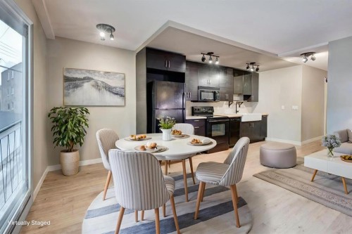 4-916 3 Avenue Nw, Calgary, AB - Indoor Photo Showing Dining Room