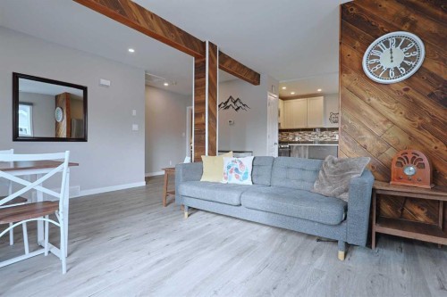 18 Maple Street, Okotoks, AB - Indoor Photo Showing Living Room