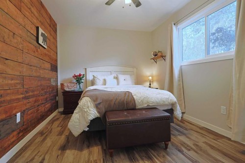18 Maple Street, Okotoks, AB - Indoor Photo Showing Bedroom