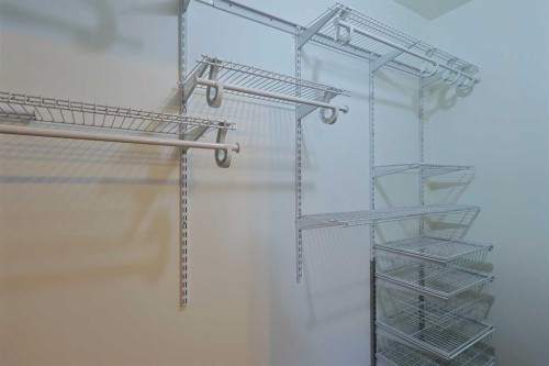 18 Maple Street, Okotoks, AB - Indoor With Storage