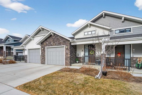 206 Crestridge Common Sw, Calgary, AB - Outdoor With Deck Patio Veranda With Facade