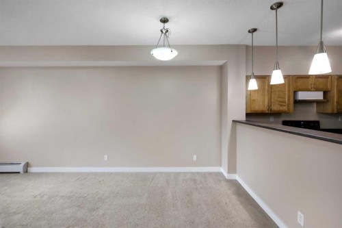 1224-2370 Bayside Road Sw, Airdrie, AB - Indoor Photo Showing Kitchen