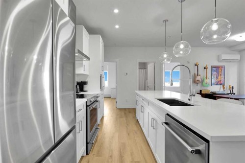 2216-200 Seton Circle Se, Calgary, AB - Indoor Photo Showing Kitchen With Double Sink With Upgraded Kitchen