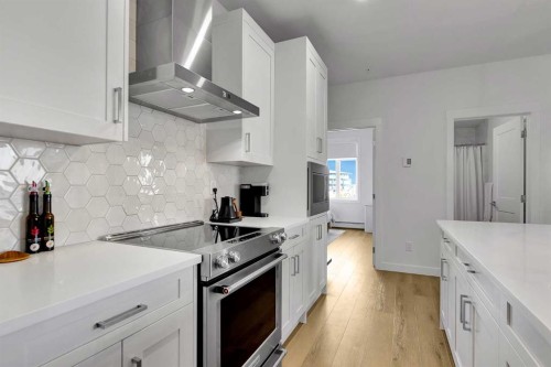2216-200 Seton Circle Se, Calgary, AB - Indoor Photo Showing Kitchen With Upgraded Kitchen