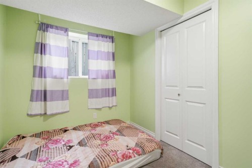 80 Taradale Drive South, Calgary, AB - Indoor Photo Showing Bedroom