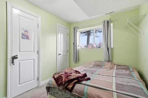 80 Taradale Drive South, Calgary, AB - Indoor Photo Showing Bedroom