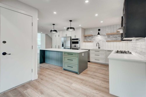 17 Millrise Lane Sw, Calgary, AB - Indoor Photo Showing Kitchen With Upgraded Kitchen