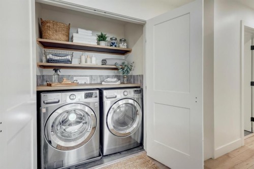 17 Millrise Lane Sw, Calgary, AB - Indoor Photo Showing Laundry Room