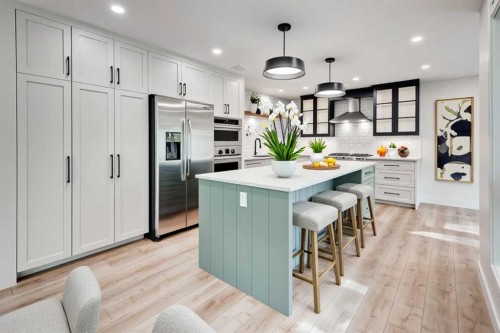 17 Millrise Lane Sw, Calgary, AB - Indoor Photo Showing Kitchen With Upgraded Kitchen