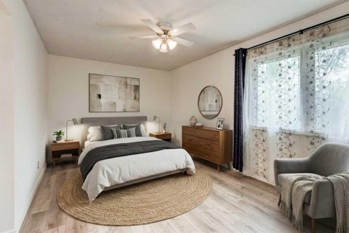 17 Millrise Lane Sw, Calgary, AB - Indoor Photo Showing Bedroom