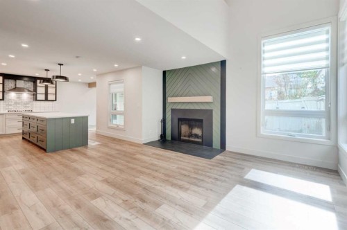 17 Millrise Lane Sw, Calgary, AB - Indoor Photo Showing Living Room With Fireplace