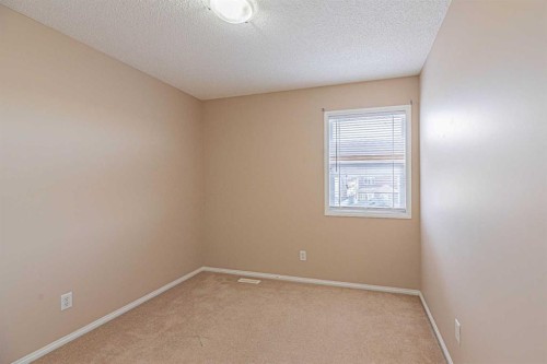 427 Saddlebrook Way Ne, Calgary, AB - Indoor Photo Showing Other Room