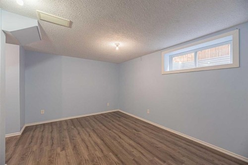 427 Saddlebrook Way Ne, Calgary, AB - Indoor Photo Showing Other Room