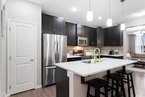 1529 Legacy Circle Se, Calgary, AB - Indoor Photo Showing Kitchen With Stainless Steel Kitchen With Upgraded Kitchen