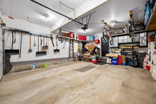 73 Sunset Heights, Cochrane, AB - Indoor Photo Showing Garage