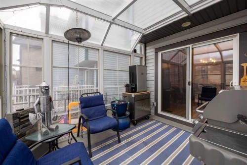 73 Sunset Heights, Cochrane, AB - Outdoor With Deck Patio Veranda With Exterior