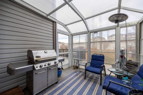 73 Sunset Heights, Cochrane, AB - Outdoor With Deck Patio Veranda With Exterior