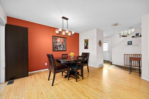 73 Sunset Heights, Cochrane, AB - Indoor Photo Showing Dining Room