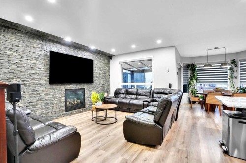 119 Panton Landing Nw, Calgary, AB - Indoor Photo Showing Living Room With Fireplace